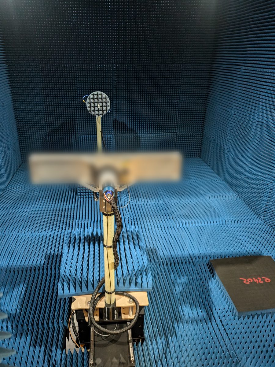 Spherical near-field chamber with the positioner arm and the probe on the far wall